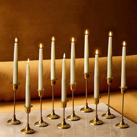 Flameless Taper Candles Set With Realistic 3D Wick Flame, 7 Inch Ivory Wax, in brass holders on marble surface