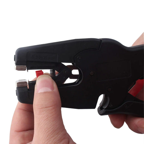 Hand using Automatic Wire Stripper And Cutter 2-In-1 Tool with auto distance positioning for electricians, close-up view.