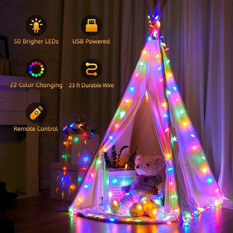 Color Changing Star String Lights USB Powered 23 Ft 50 LEDs illuminate a teepee with remote control and timer indoors.