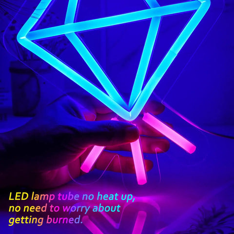 Hand holding lit neon sign led acrylic wall light decor for home office lounge and patio, unique neon shapes from diamond and pizza.