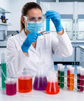 Scientist using Ultimate 22 Piece Plastic Labware Set For DIY Home Science with beaker and test tube in lab