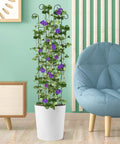 Four Pack 32 Inch Tall Wave Shape Black Metal Garden Trellis Set for Climbing Plants Indoors and Outdoors with flowers