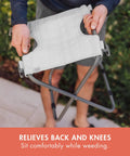 Person holding Gardener Two Point Zero Folding Seat With Tools All In One Portable Garden Stool, Fog Gray