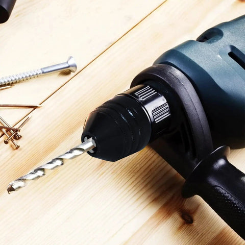 Black 1/4 Inch Hex Shank Keyless Drill Chuck Quick Change Adapter Converter for Impact Drills, installed on drill with bit
