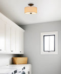 Addison 13 Inch Dope Modern Drum Semi Flush Mount Ceiling Light With Off White Fabric Drum Shade Two Light Fixture installed in laundry room