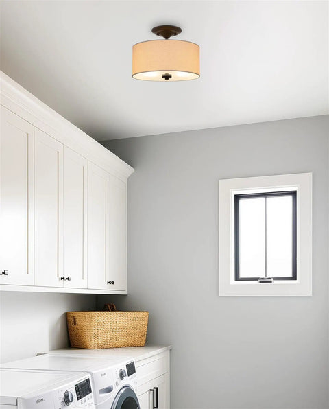 Addison 13 Inch Dope Modern Drum Semi Flush Mount Ceiling Light With Off White Fabric Drum Shade Two Light Fixture installed in laundry room