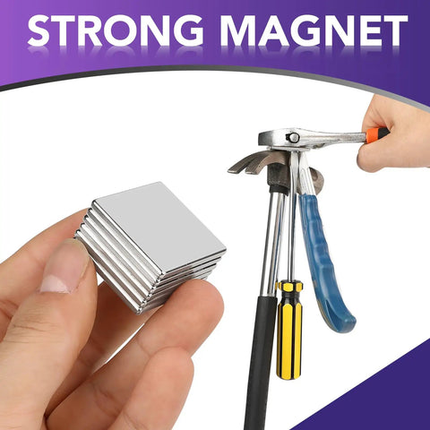 Ultra Strong Neodymium Square Magnets Pack Of 6 1.16 Inch Square By 1/8 Inch Thick Rare Earth Fridge Magnets in hand and near tools.