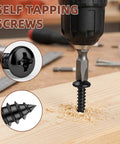 Tough As Nails Number 12 By 1 Inch Pan Head Self Tapping Screws Black Finish 304 Stainless Steel Phillips Drive inserted into wood.