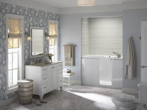 Devonshire Style Wall Sconce Bath Vanity Light With Frosted Glass Shade, Brushed Nickel Finish next to vanity in elegant bathroom