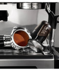 No Drama 2 In 1 Coffee Tamper And Constant Pressure Espresso Distribution Tool With Calibrated Spring For Even Powder Pressing and Flawless Puck Prep In 58mm Silver on espresso machine with portafilter.