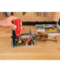 Hella Grippy Heavy Duty Red Handle Six In One Quick Change Multi Bit Screwdriver With Dual Nut Drivers And Phillips Bits being used on electronics.