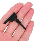 Thirty Piece Black Silicone Cooling Fan Mounting Screws For Pc Computer Case held in hand showcasing dampening rubber sleeve detail.