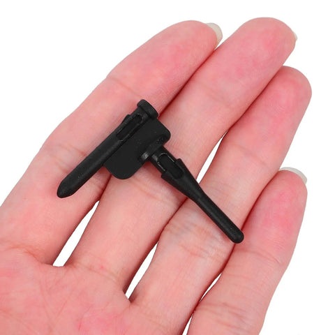 Thirty Piece Black Silicone Cooling Fan Mounting Screws For Pc Computer Case held in hand showcasing dampening rubber sleeve detail.