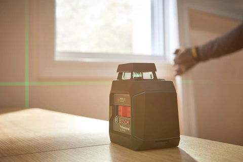 Green Beam Self Leveling 360 Degree Cross Line Laser With Batteries Included L Bracket Ceiling Clip And Hard Carrying Case For Pro Grade Horizontal And Vertical Layouts On The Job Site on a table with laser line visible