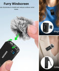 Close-up of AI Wireless Lavalier Microphone with furry windscreen, magnet clip, and collar clip for outdoor use.