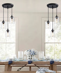 Three Light Pendant Lighting Fixture For Kitchen Island And Dining Area With Adjustable Cords And Glass Shades In Black Finish