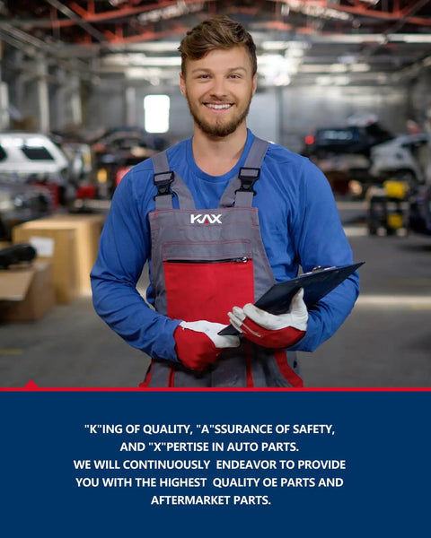 Mechanic holding clipboard in auto repair workshop, wearing blue and red uniform with logo visible.