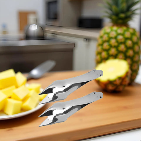 Stainless Steel Pineapple Eye Remover And Core Cutter With V Shaped Tip near cut pineapple on counter