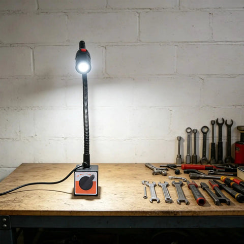 Heavy Duty Led Magnetic Work Light With Flexible Gooseneck Lamp Providing 550 To 650 Lumens on workbench with tools.