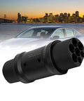 Heavy Duty Plug And Play Nacs To Gbt Ev Charging Adapter 48a Ac Slow Charge Weather Tough black adapter with 7 ports for EV charging.