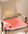 Cozy Brown Heated Seat Pad With Soft Plush Cushion For Office Chair At Home Or Work Featuring 3 Adjustable Heat Settings To Keep You Warm During Chilly Winter Days And Ensure Superior Comfort All Year Round, showcasing 65° heat display.