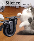 Built Legit 4 Inch Heavy Duty Caster Wheels Set Of Four With Dead Quiet Rubber Tires displayed near a playful cat on wooden floor.