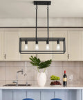 Black 4 Light Dope Industrial Vintage Chandelier With Open Rectangular Cage Frame In Matte Finish above kitchen island