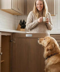 Get These Super Sleek 8Pcs Ultra Thin Magnetic Cabinet Door Catches For A No Drill Install That Looks Totally Sick And Keeps Your Doors Shut Silent With Zero Mess Or Tools Needed. in kitchen with dog nearby.