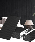 Hassle Free Peel And Stick Acoustic Wall Panels 10 Pack Sound Dampening Foam Tiles in black, 48x24 inches, for noise reduction.
