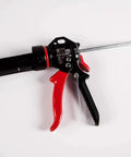 Extreme Duty 9 Inch Caulk Gun Workhorse With 26 To 1 Thrust Ratio And 950 Lb Force, featuring revolving barrel and ergonomic grip.