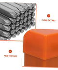 Close-up of 37 Piece Metal Letter And Number Stamp Set With Heart Symbols Punch Kit showcasing metal stamps and orange case