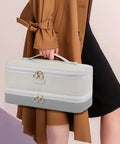 Woman holding Two Layer Travel Hair Tool Case For Dyson Airwrap Styler And Supersonic Dryer Fits Shark Flexstyle FlexFusion