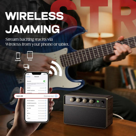 10W Portable Guitar Amp With Rechargeable Battery, showing use with wireless audio and smartphone connectivity for jamming.