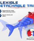 Close-up of detachable tail on Remote Control Shark Toy For Kids Rad Totally Dual Motors RC Shark with segmented blue tail.