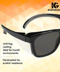 Close-up of Unisex Maverick Safety Glasses with anti-fog smoke lenses, black frame, highlighting anti-fog and scratch resistance features.
