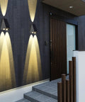 Solar Powered Up Down Wall Lights Dusk To Dawn Outdoor Flood Lights Sconce illuminating a modern house entry