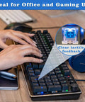 Person typing on keyboard with Blue 3 Pin Clicky Tactile Mechanical Keyboard Switches 50 Pcs DIY Replacement Kit shown