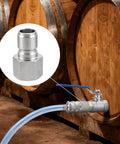 Heavy Duty Stainless Steel Male Quick Disconnect Coupler Half Inch Pipe Thread in use with barrels, perfect for homebrewing.