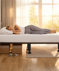 Adjustable Metal Bed Risers 6 Piece Set 10.2 To 16.5 Inches Tall under a mattress with a woman sleeping peacefully.