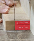 Close-up of Pro Grade Setup Blocks Height Gauge Set For Router And Table Saw Seventeen Piece Aluminum Height Master in use on wood.