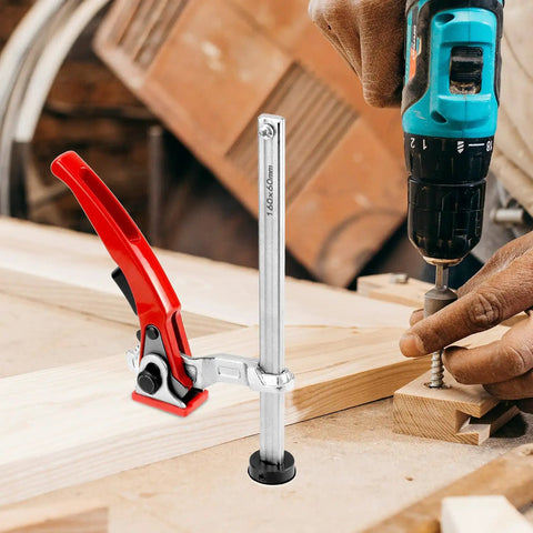 Built To Last Clamping Element 20mm Diameter For Multifunctional Tables, 160mm Clamping Range, 60mm Throat Depth, Chrome Plated Steel, Anti Pinch Soft Pads, Multi Angle Locking, Ratchet Arm For Fast Secure Hold, shown with drill