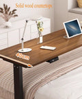 Stunning Electric Over Bed Table With Rolling Wheels And Adjustable Height, Perfect Versatile Standing Workstation Cart For Bedroom Home Office That Lifts Easy From Sitting To Standing With Spacious Storage Surface In Cool Grey Finish, showcasing solid wood countertop and 40cm width.