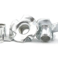 Tough As Nails Zinc Plated Carbon Steel Tee Nuts Four Pronged M4 X 6 5mm industrial fasteners in a group, showing silver finish.