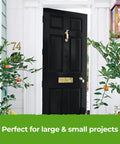 All In One Paint And Primer Black Matte 8.5 Fl Oz Sample One Coat Formula on black front door with brass hardware