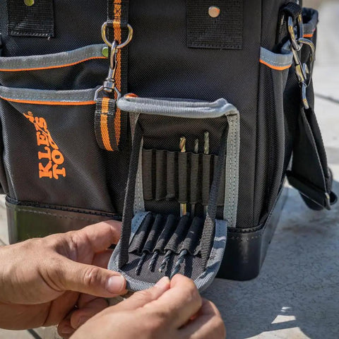Detail of Heavy Duty Tool Bag With Shoulder Strap And 40 Pockets In Bright Orange Interior For Fast Tool Access, Molded Bottom For Stability