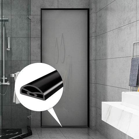 Slick Nifty 39 Inch Black Shower Threshold Water Dam Stopper showing flexible hollow cutout for seamless bathroom separation