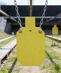 Yellow Ar500 Steel Silhouette Target 7 By 12 Inches Half Inch Thick For Rifle Practice at outdoor shooting range
