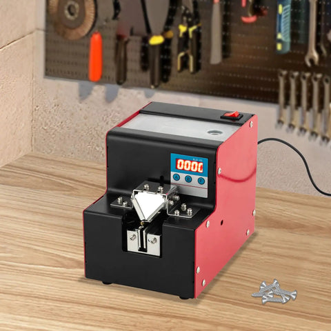 Automatic Screw Feeder Machine Features High Speed Dual Counting Modes To Slash Electronics Assembly Time sits on workbench.