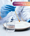 Lead test kit swabs in a lab; blue-gloved hands use a swab over a plate, beaker labeled VINEGAR.
