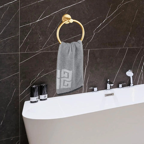 Slick Wall Mounted Towel Ring Crafted From Premium Stainless Steel tailored for top shelf bathrooms and kitchens with a gray towel.